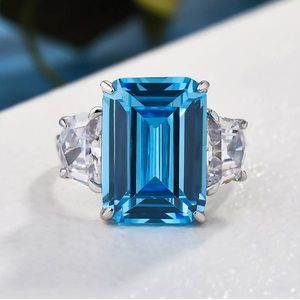 6 Ct Emerald Cut Light Aquamarine Blue Three Stone Ring in Sterling Silver